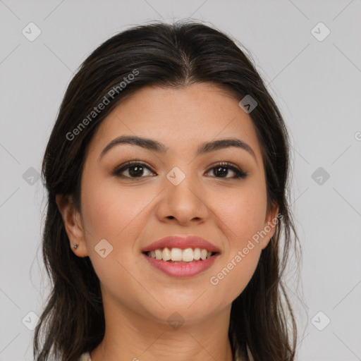 Joyful asian young-adult female with long  brown hair and brown eyes