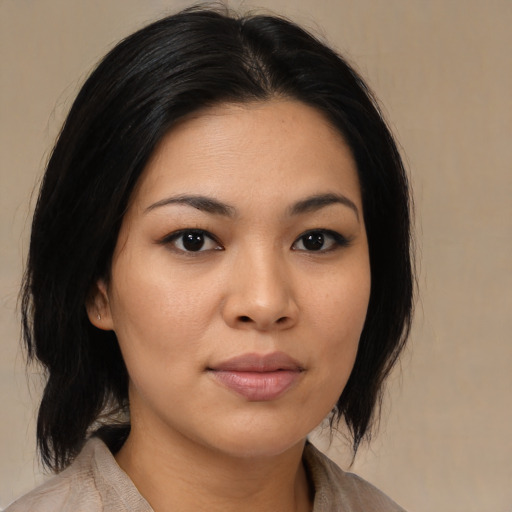 Neutral asian young-adult female with medium  black hair and brown eyes