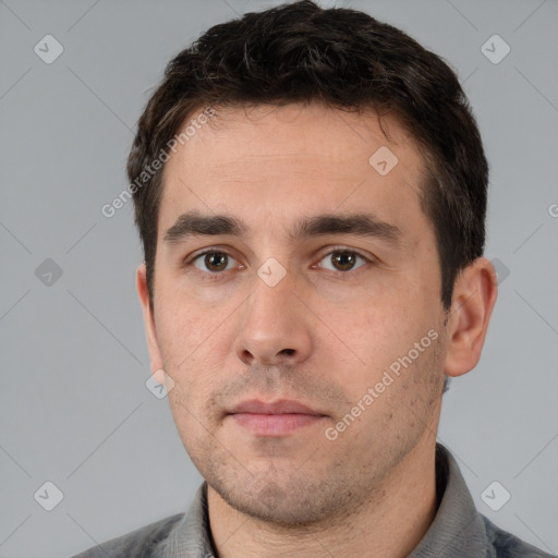 Neutral white young-adult male with short  brown hair and brown eyes