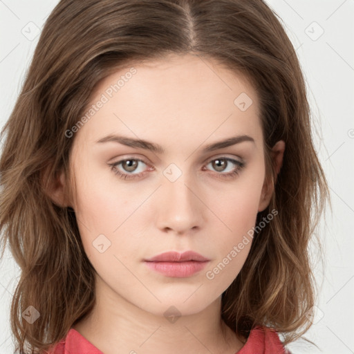 Neutral white young-adult female with long  brown hair and brown eyes