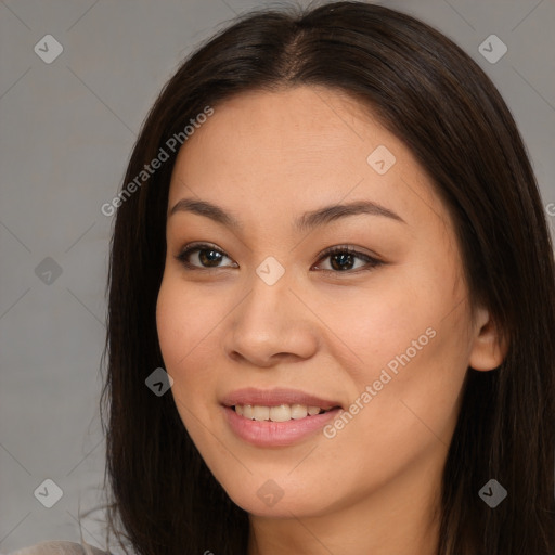 Joyful asian young-adult female with long  brown hair and brown eyes