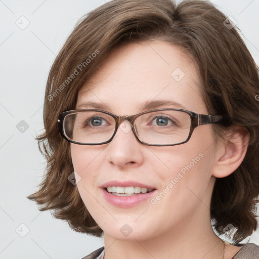 Joyful white young-adult female with medium  brown hair and blue eyes