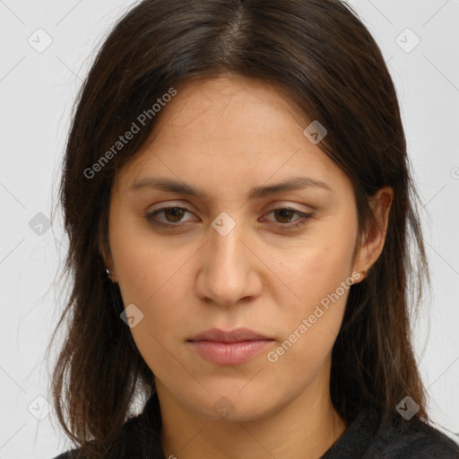 Neutral white young-adult female with long  brown hair and brown eyes