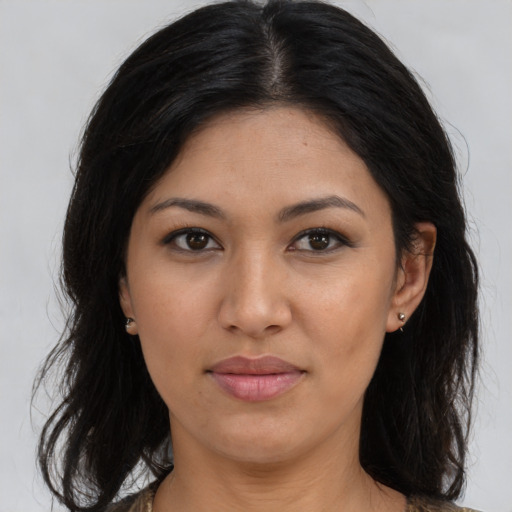 Joyful asian young-adult female with medium  black hair and brown eyes