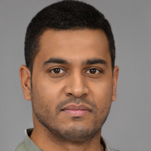 Neutral latino young-adult male with short  brown hair and brown eyes