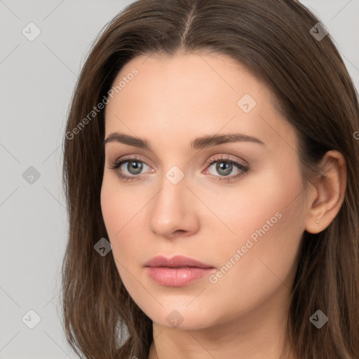 Neutral white young-adult female with long  brown hair and brown eyes