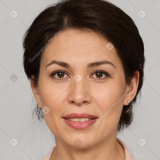 Joyful white adult female with medium  brown hair and brown eyes