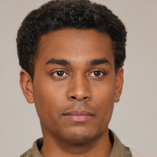 Neutral latino young-adult male with short  brown hair and brown eyes