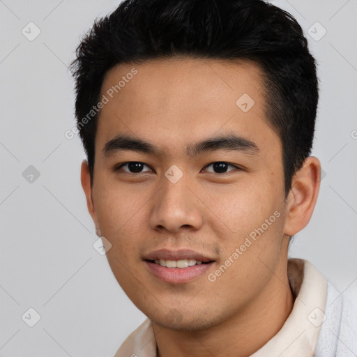 Joyful asian young-adult male with short  black hair and brown eyes