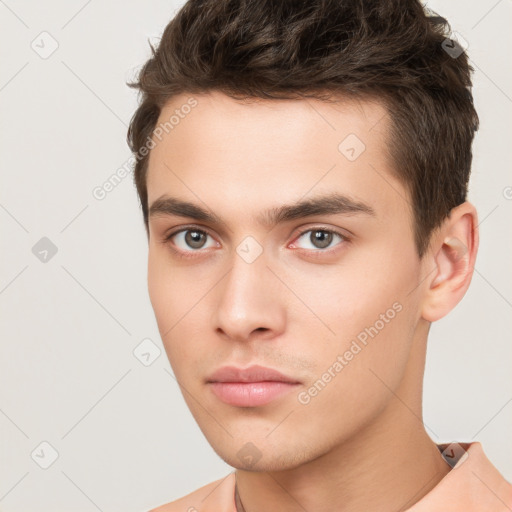 Neutral white young-adult male with short  brown hair and brown eyes