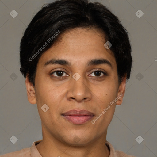 Joyful latino young-adult female with short  brown hair and brown eyes