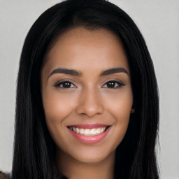 Joyful white young-adult female with long  black hair and brown eyes