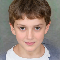 Joyful white child male with short  brown hair and brown eyes