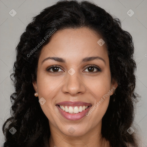 Joyful latino young-adult female with long  brown hair and brown eyes