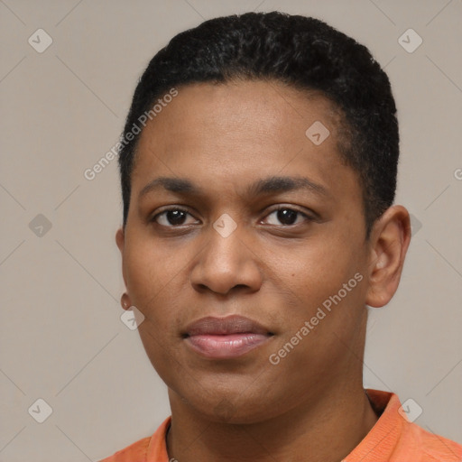 Joyful black young-adult male with short  black hair and brown eyes