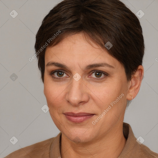 Joyful white adult female with short  brown hair and brown eyes