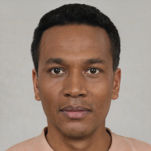 Neutral black young-adult male with short  black hair and brown eyes