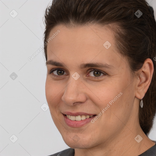 Joyful white young-adult female with medium  brown hair and brown eyes