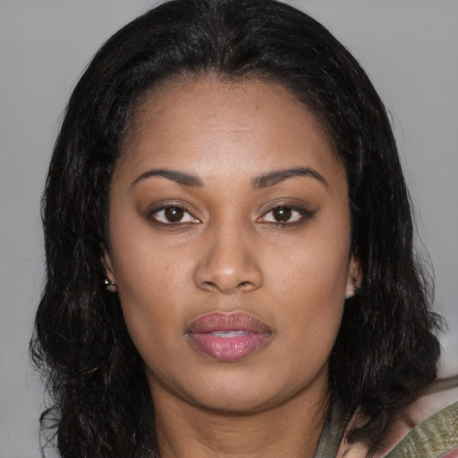 Joyful white young-adult female with long  black hair and brown eyes