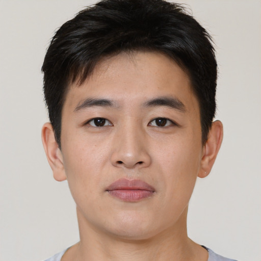 Neutral asian young-adult male with short  black hair and brown eyes