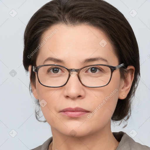 Neutral white young-adult female with medium  brown hair and brown eyes