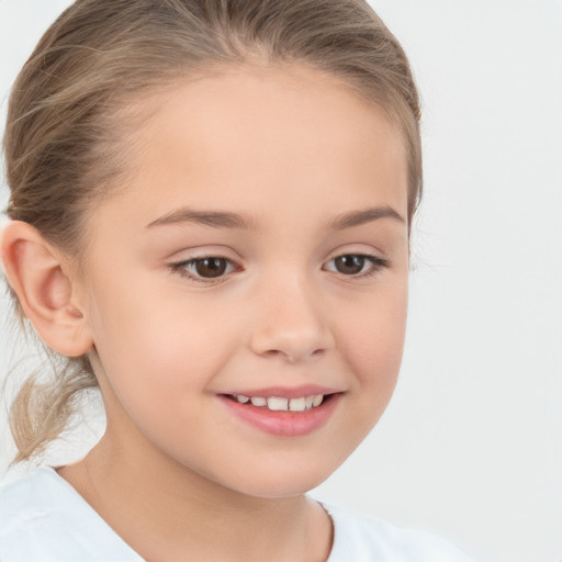 Joyful white child female with medium  brown hair and brown eyes