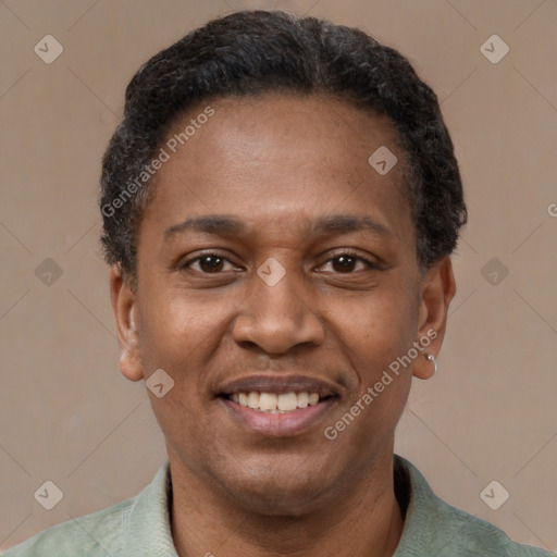 Joyful latino adult male with short  black hair and brown eyes