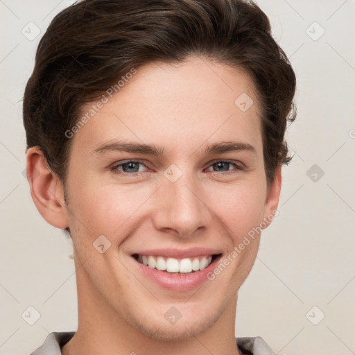 Joyful white young-adult female with short  brown hair and grey eyes