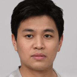 Neutral asian young-adult male with short  black hair and brown eyes