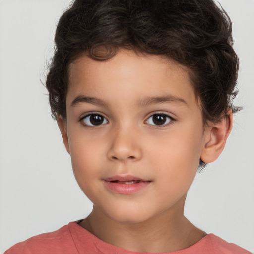 Joyful white child male with short  brown hair and brown eyes