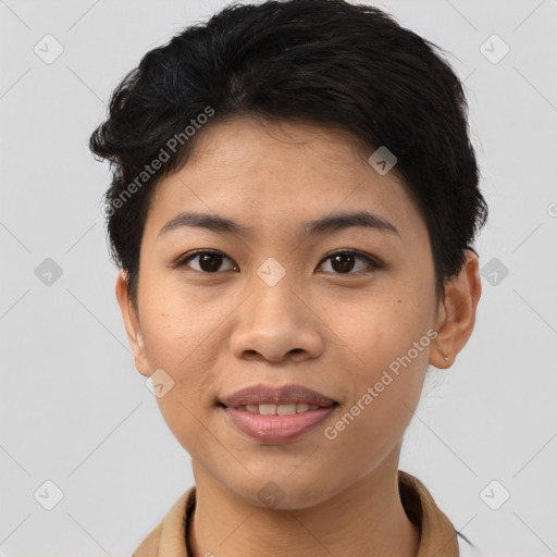 Joyful asian young-adult female with short  black hair and brown eyes