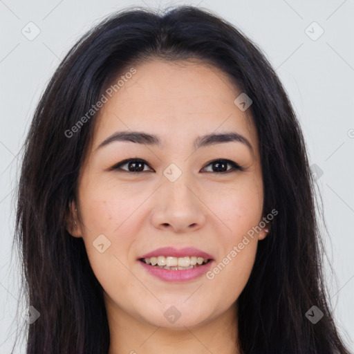 Joyful asian young-adult female with long  brown hair and brown eyes