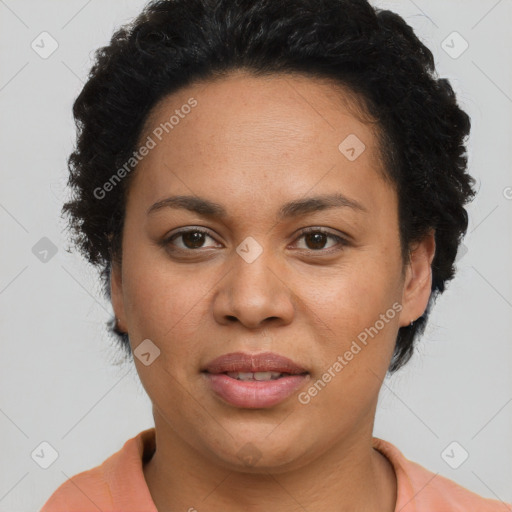 Joyful latino adult female with short  brown hair and brown eyes