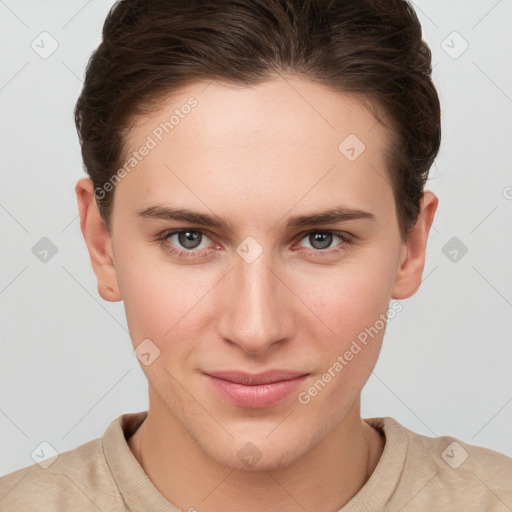 Joyful white young-adult female with short  brown hair and grey eyes