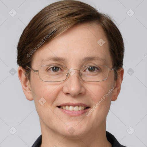 Joyful white adult female with short  brown hair and grey eyes