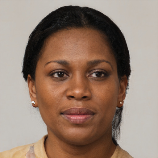 Neutral black young-adult female with short  brown hair and brown eyes