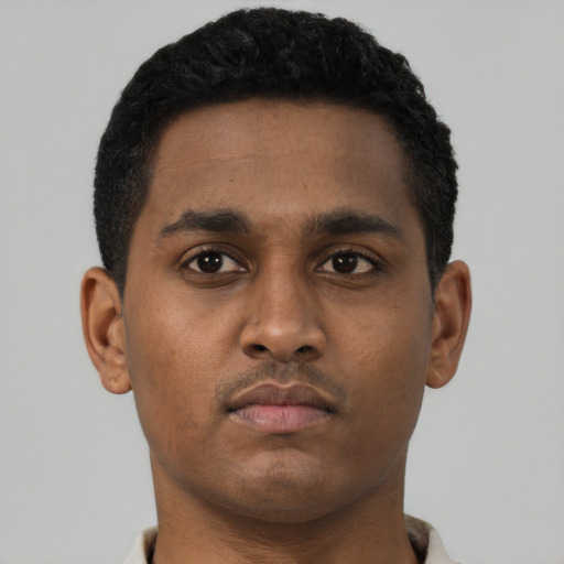 Neutral black young-adult male with short  brown hair and brown eyes