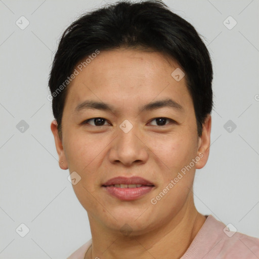 Joyful asian young-adult male with short  brown hair and brown eyes