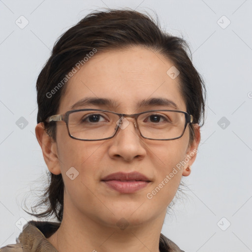 Joyful white adult female with medium  brown hair and brown eyes