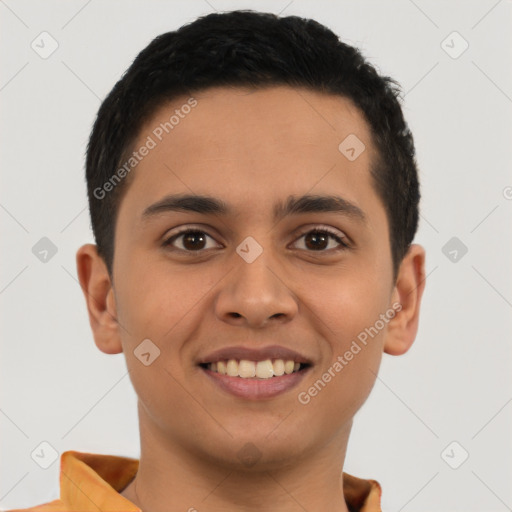 Joyful latino young-adult male with short  brown hair and brown eyes