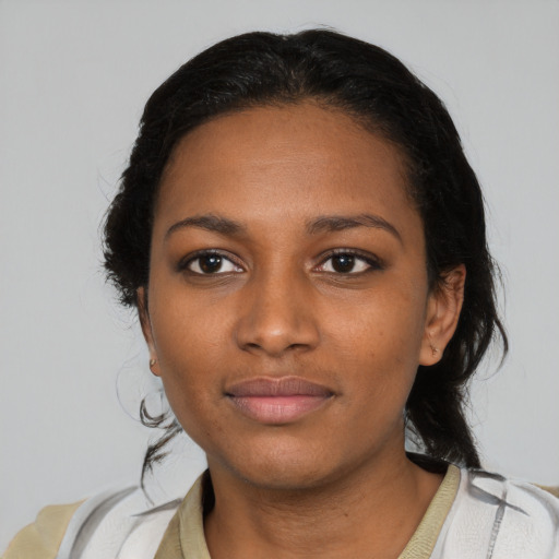 Neutral black young-adult female with medium  black hair and brown eyes