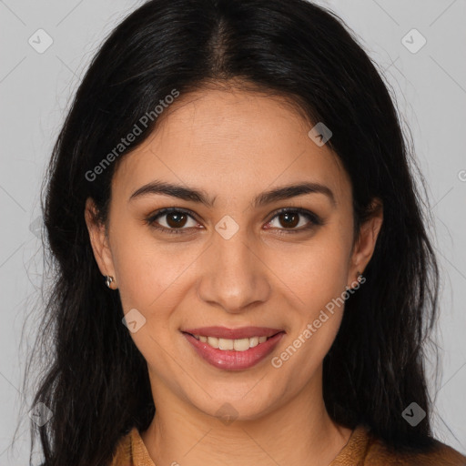 Joyful latino young-adult female with long  brown hair and brown eyes