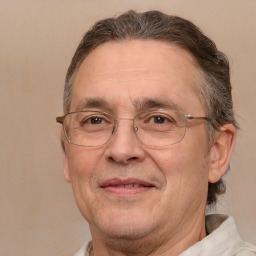 Joyful white middle-aged male with short  brown hair and brown eyes