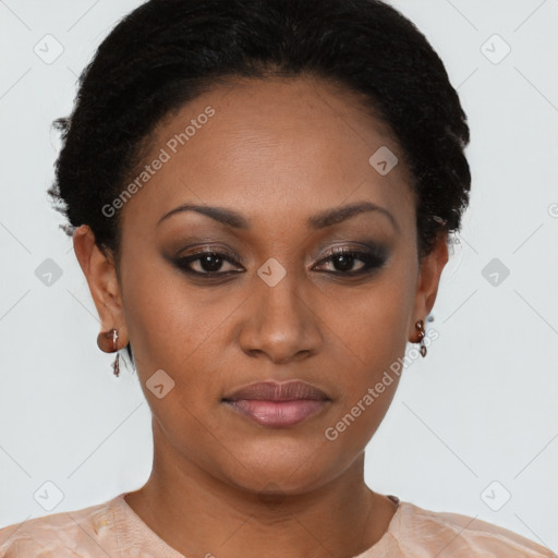 Joyful black young-adult female with short  brown hair and brown eyes