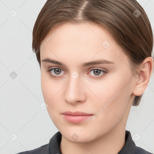 Neutral white young-adult female with short  brown hair and brown eyes