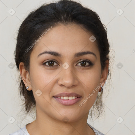 Joyful latino young-adult female with medium  brown hair and brown eyes