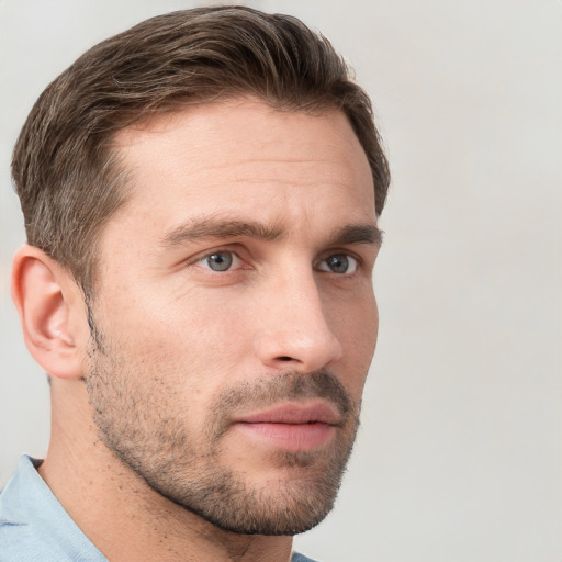 Neutral white young-adult male with short  brown hair and grey eyes