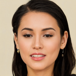 Joyful white young-adult female with long  black hair and brown eyes