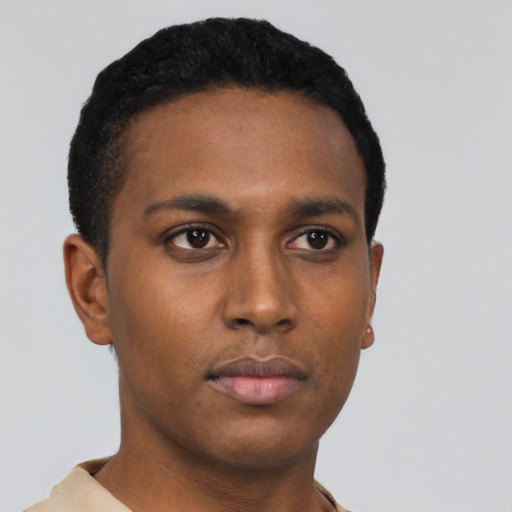 Neutral black young-adult male with short  black hair and brown eyes