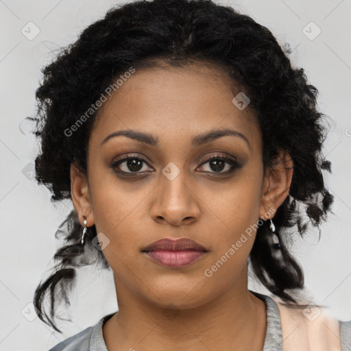 Joyful black young-adult female with medium  black hair and brown eyes